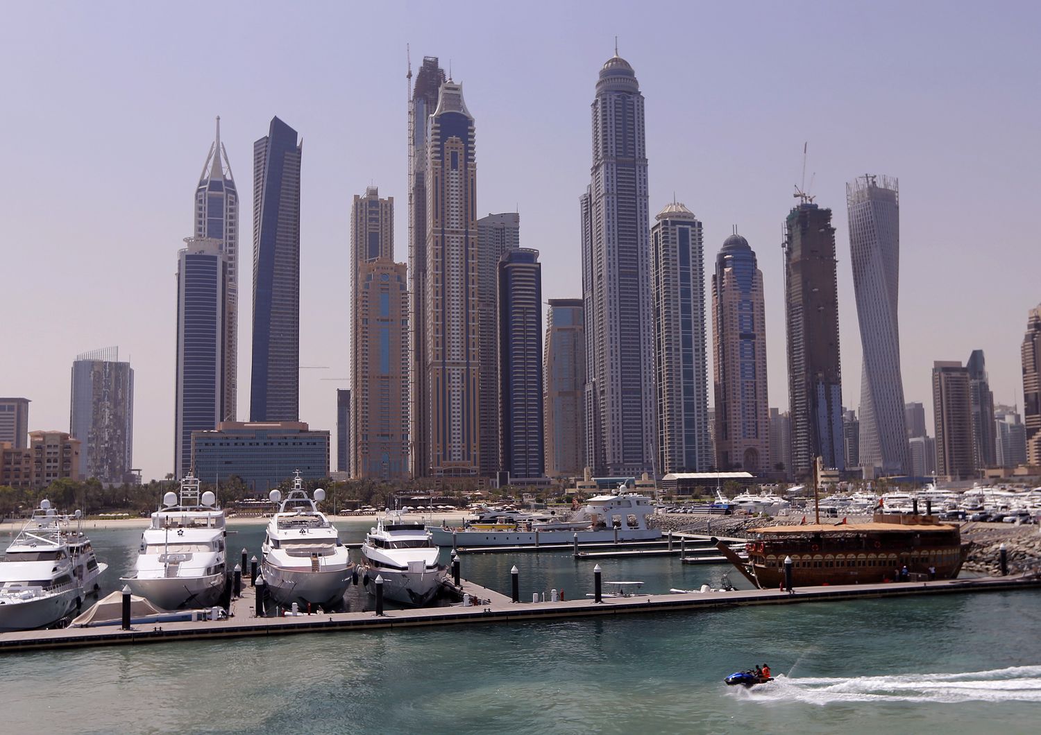 Barche ormeggiate al Marine Club Internazionale,grattacieli a Dubai, Emirati Arabi Uniti (Afp)&nbsp;
