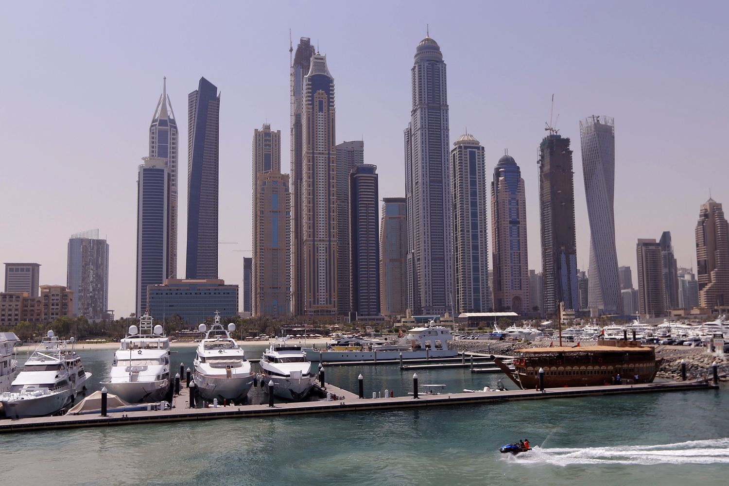 Barche ormeggiate al Marine Club Internazionale,grattacieli a Dubai, Emirati Arabi Uniti (Afp)&nbsp;