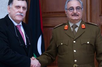 Al-Serraj e Haftar (Afp)