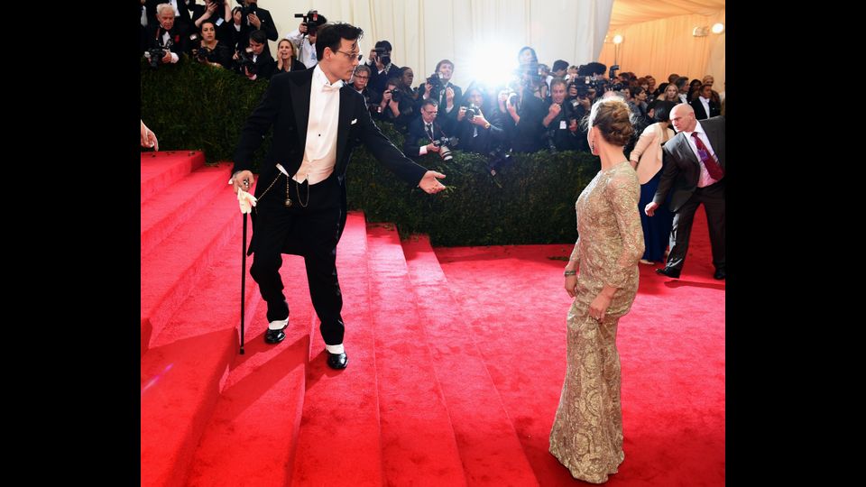 Johnny Depp  e Amber Heard arrivano all'nstitute Benefit presso il Metropolitan Museum, 5 Maggio 2014 a New York (Afp)