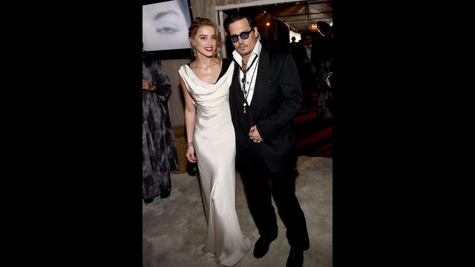 Johnny Depp e Amber Heard all'8 &deg; Gala presentato dalla Art of Elysium e Samsung Galaxy a Hangar, Los Angeles, California, nel gennaio 2015 &nbsp;(Afp)