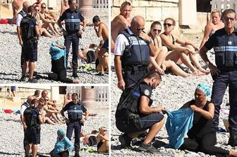 &nbsp;Nizza costretta a togliere burkini (foto twitter)