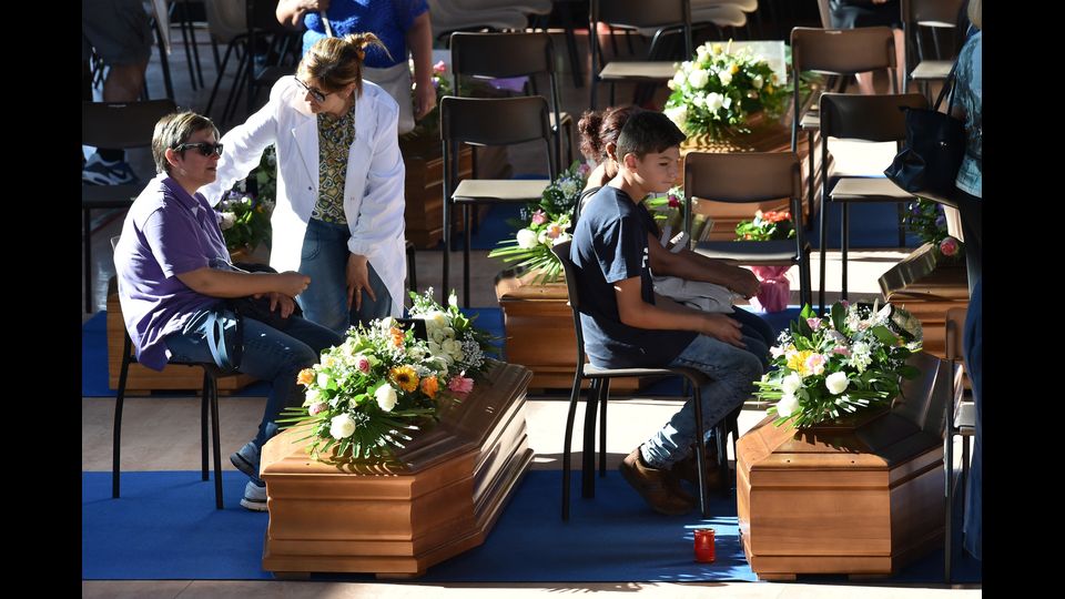 Terremoto, il giorno del lutto (Afp)&nbsp;