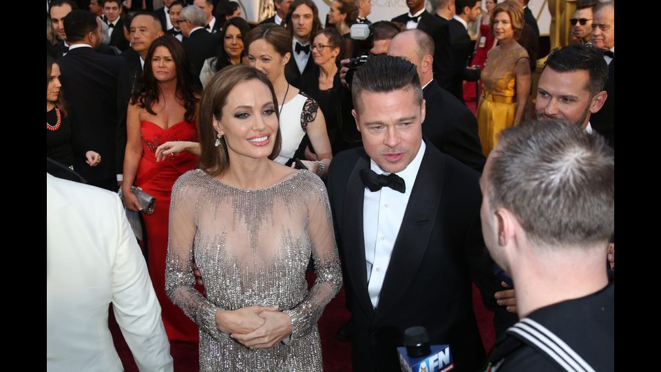 Angelina Jolie e Brad Pitt all'Academy Awards nel 2014 (Afp)