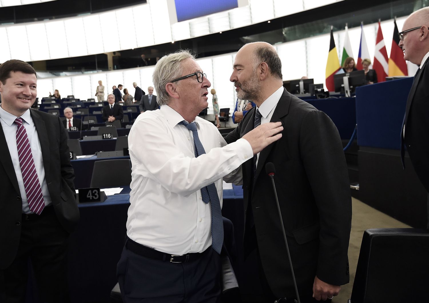 Juncker Moscovici (Afp)