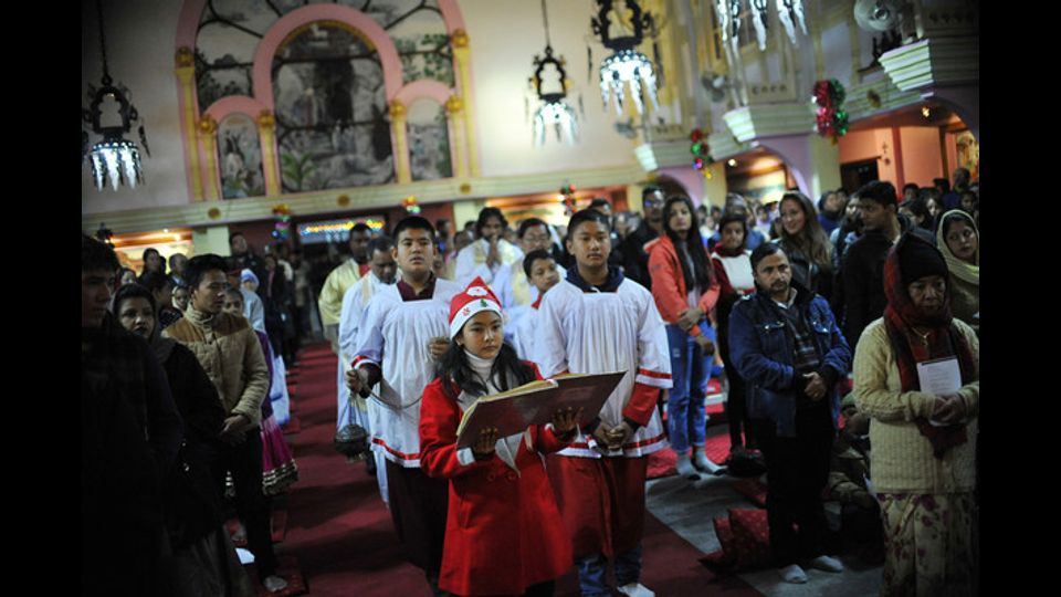 Messa della notte di Natale a Lalitpur, Nepal (foto Afp)&nbsp;