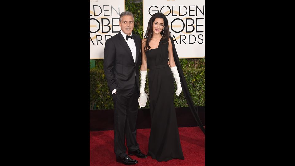 &nbsp;George Clooney e Amal Clooney partecipano al 72mo &nbsp;anniversario del Golden Globe a Beverly Hills, l'11 gennaio 2015 (Afp)