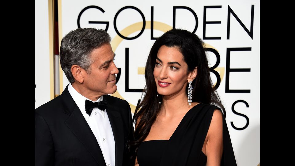 &nbsp;George Clooney e Amal Clooney partecipano al 72mo &nbsp;anniversario del Golden Globe a Beverly Hills, l'11 gennaio 2015 (Afp)