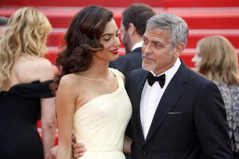 &nbsp;George Clooney e la moglie Amal al 69mo Festival di Cannes, il 12 maggio 2016 (Afp)
