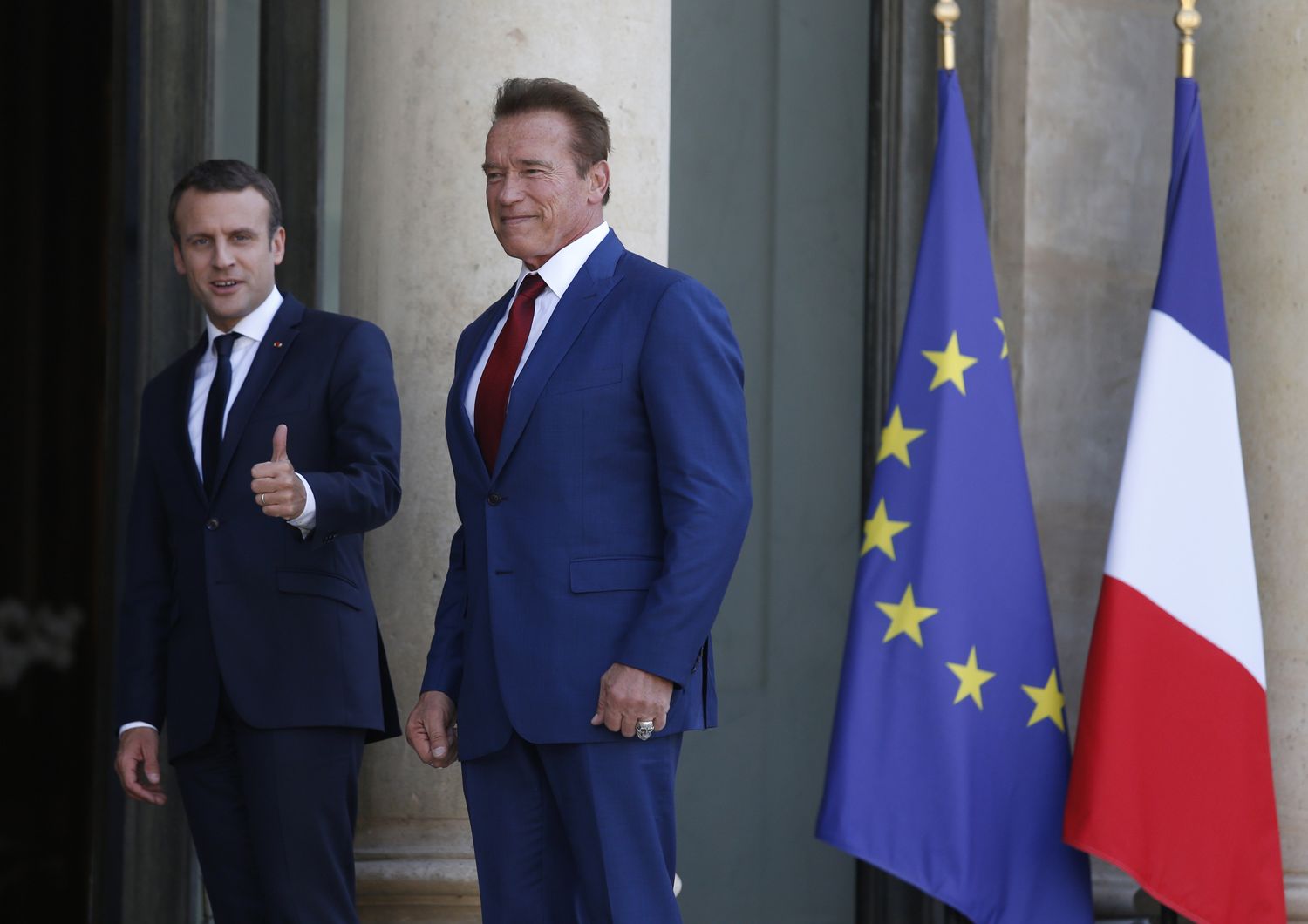 &nbsp;Il presidente francese Emmanuel Macron e l'attore Arnold Schwarzenegger