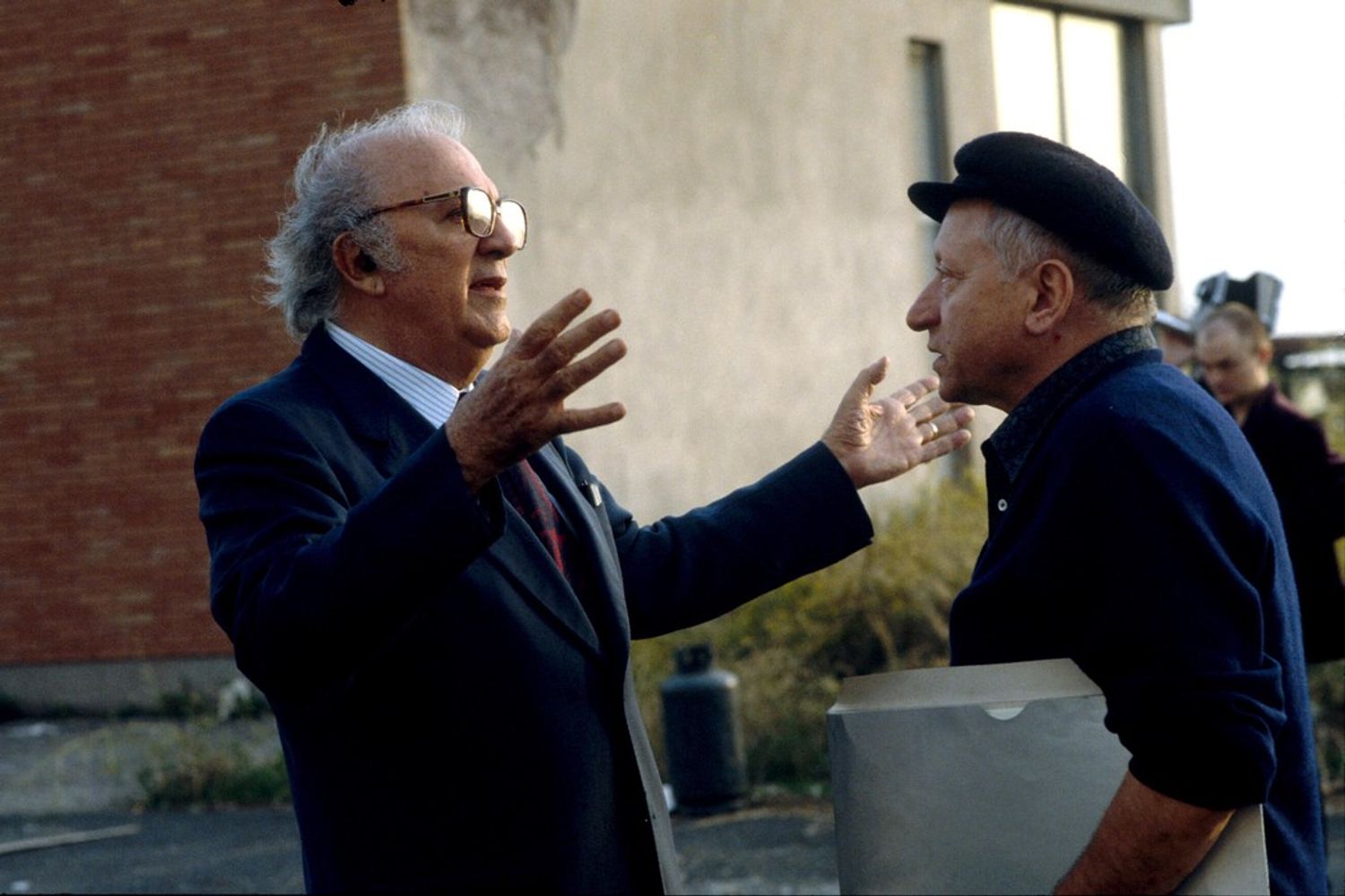 &nbsp;scenografo e costumista Danilo Donati con Federico Fellini (Agf)