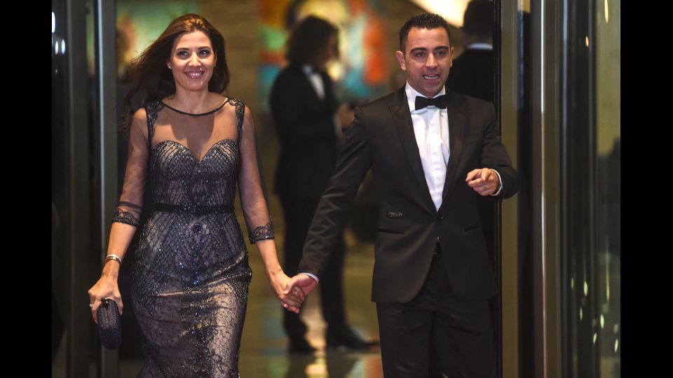 GLI INVITATI. Il calciatore del Barcellona Xavi Hernandez e sua moglie (AFP)&nbsp;