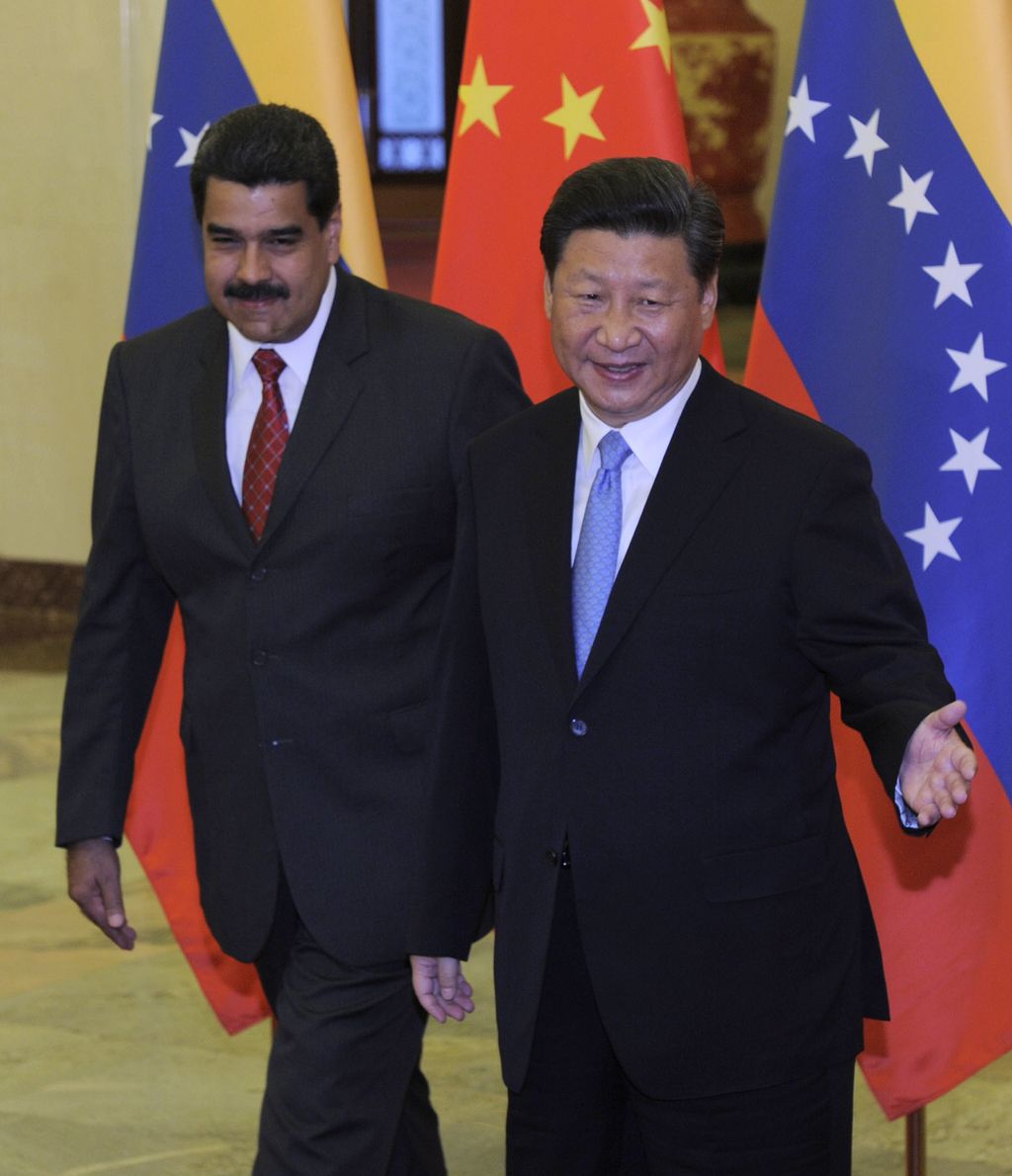 il presidente venezuelano Nicolas Maduro e il presidente cinese Xi Jinping (Afp)&nbsp;