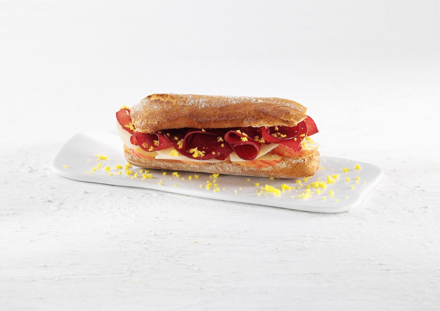 Panino bresaola, mela Rokit, asiago giovane e rosso d'uovo