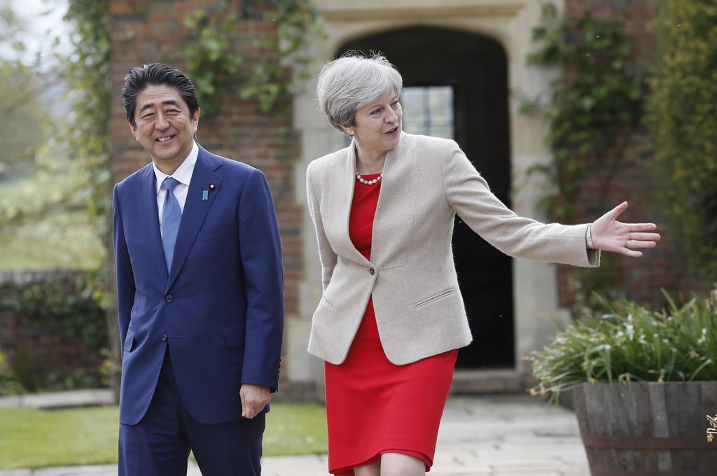 &nbsp;Shinzo Abe e Theresa May