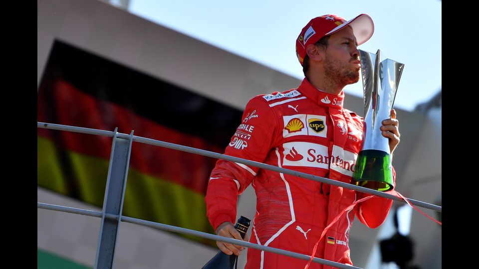 &nbsp;Gran Premio di F1 a Monza, il terzo classificzto Sebastian Vettel sul podio. (Afp)&nbsp;
