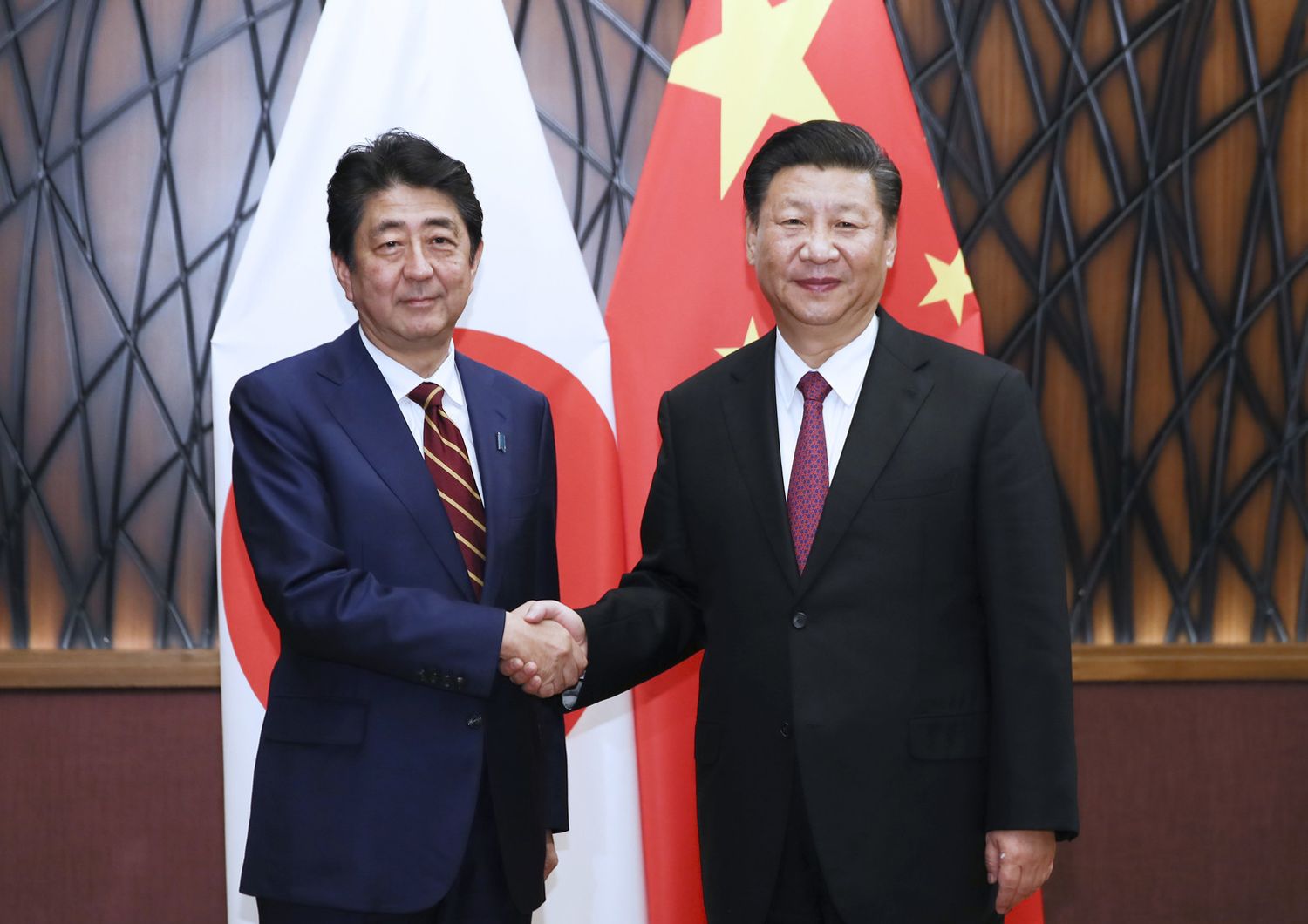 &nbsp;Shinzo Abe e Xi Jinping