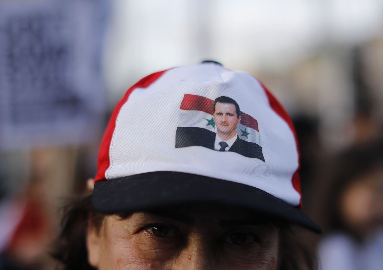 &nbsp;Una donna durante una manifestazione pro-Assad a Damasco