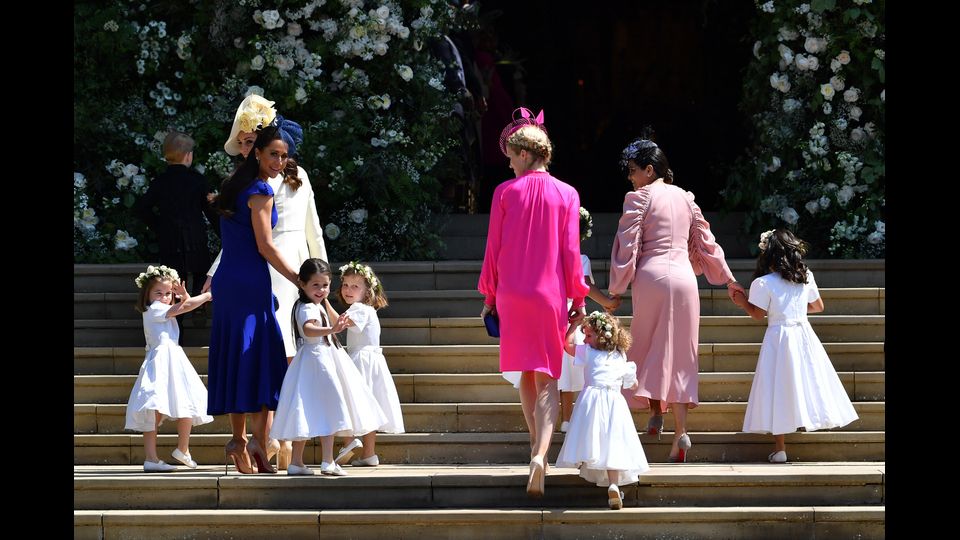 Kate Middelton, Duchessa di Cambridge, e la stilista canadese Jessica Mulroney (amica di Meghan) con le damigelle mentre arrivano per la cerimonia nuziale alla St George's Chapel a Windsor