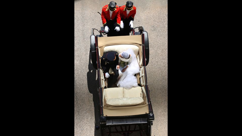 Il principe Harry con la moglie Meghan Markle &nbsp;