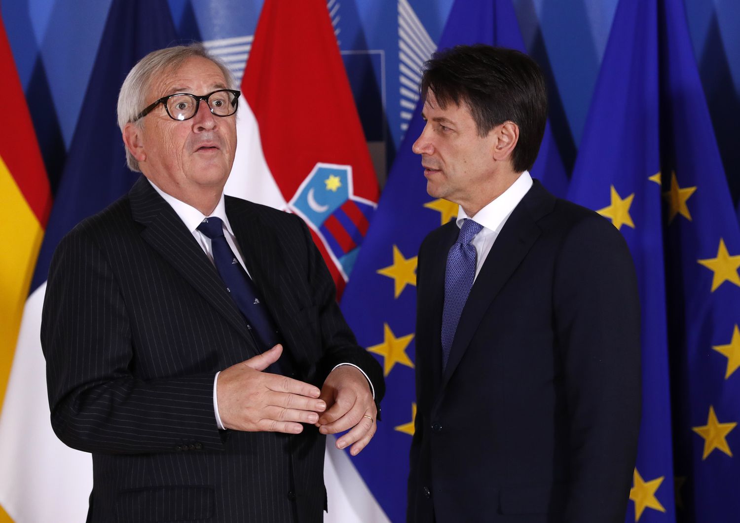 Jean-Claude Juncker - Giuseppe Conte (AFP)