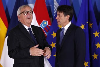 Jean-Claude Juncker - Giuseppe Conte (AFP)