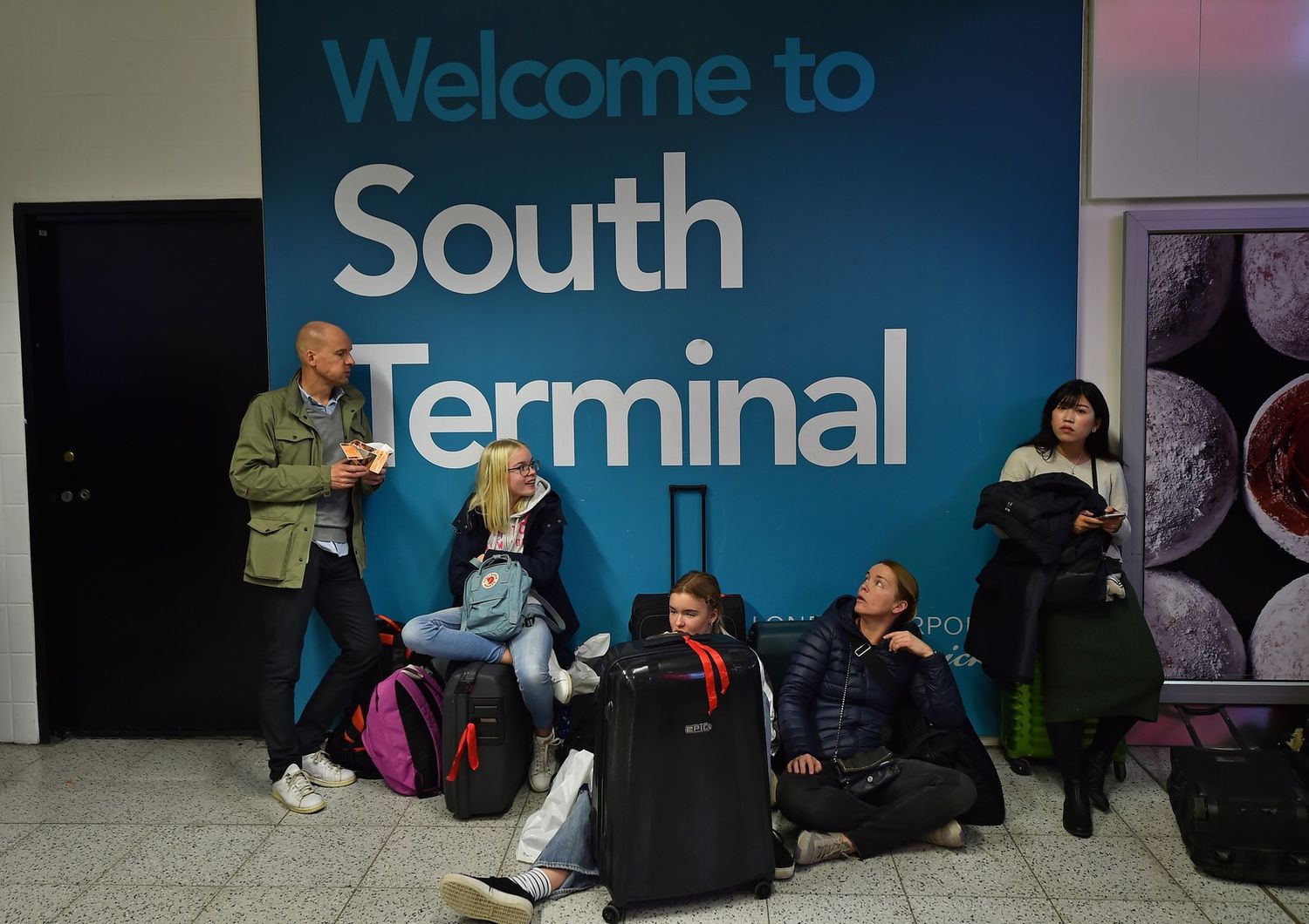 &nbsp;Passeggeri in attesa nell'aeroporto di Gatwick