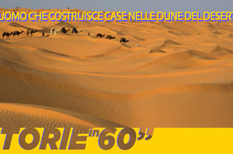 L&#39;uomo che costruisce case nelle dune del deserto