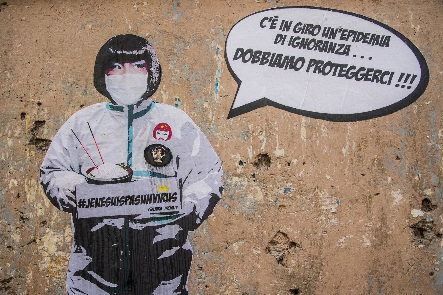 Murale della street artist Laika sul coronavirus, che raffigura Sonia la proprietaria del ristorante cinese Hang Zhou all'Esquilino