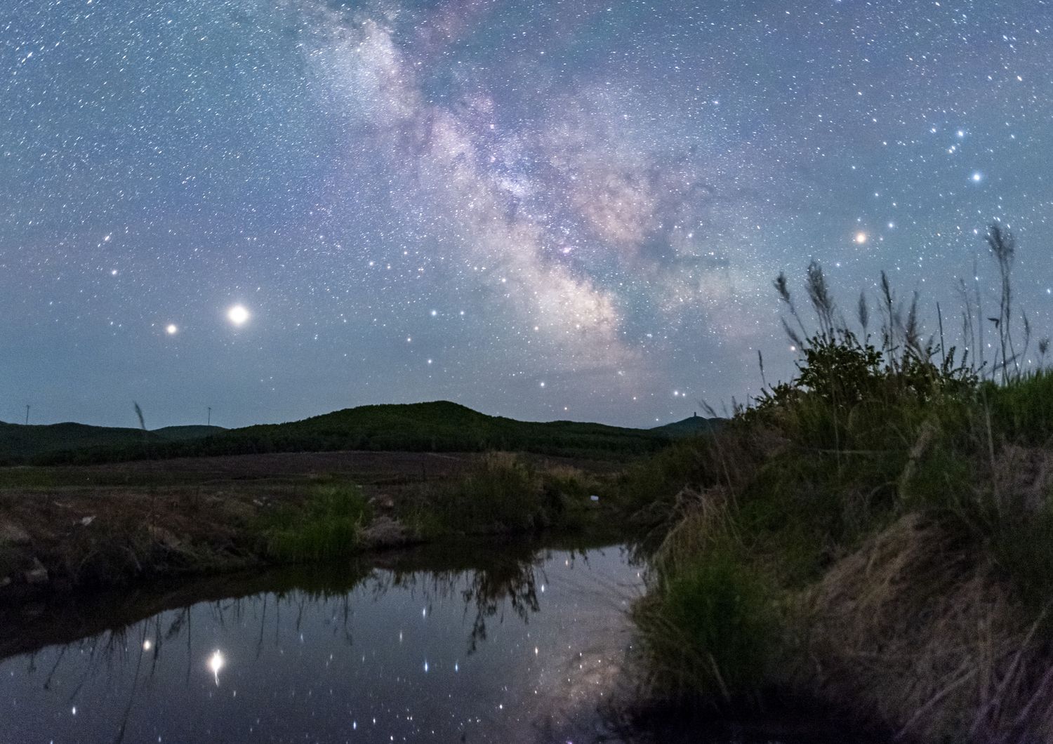 La Via Lattea fotograta dal parco naturale dei monti Fengmi, in Cina