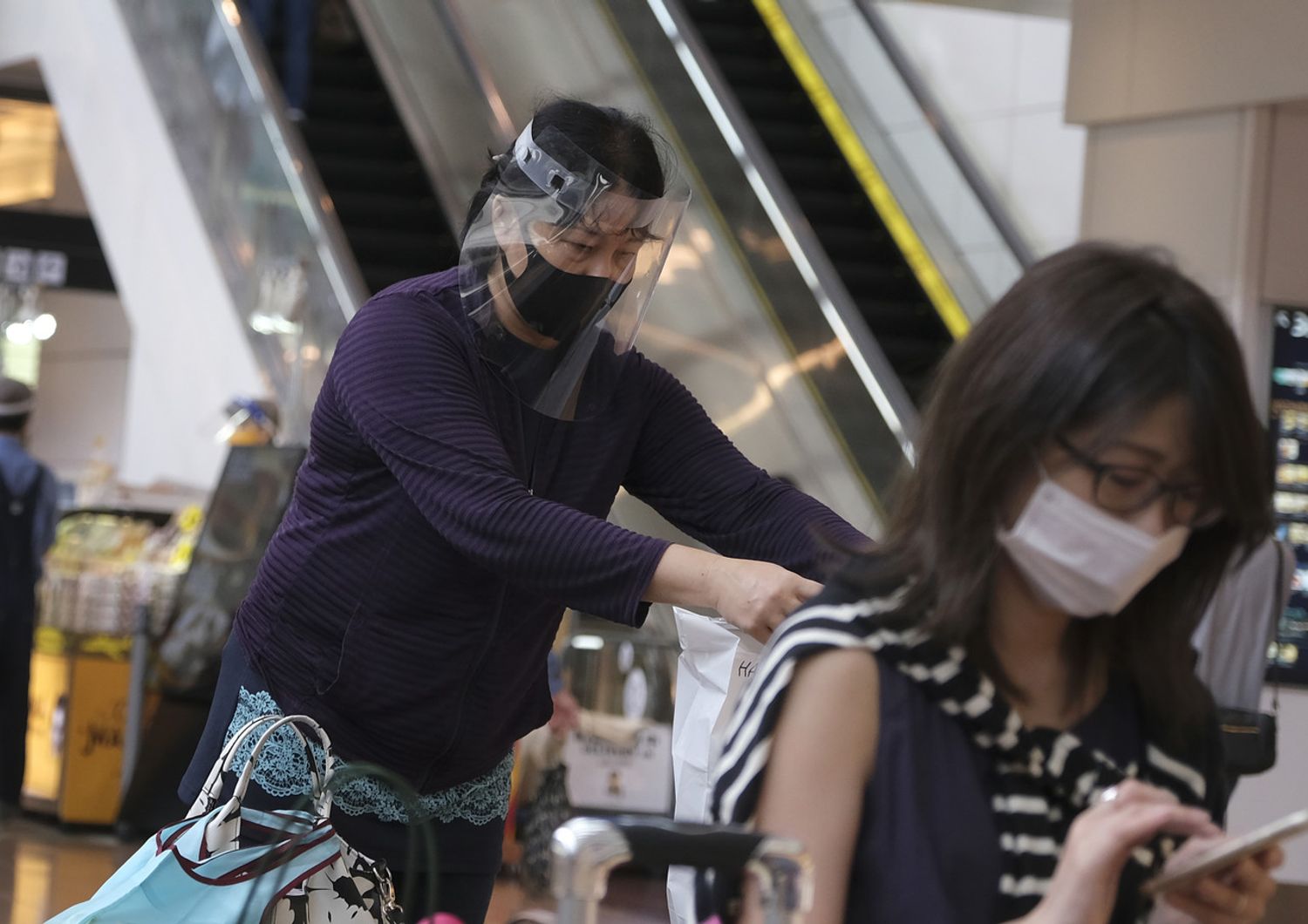 Turisti all'aeroporto di Haneda, Tokyo