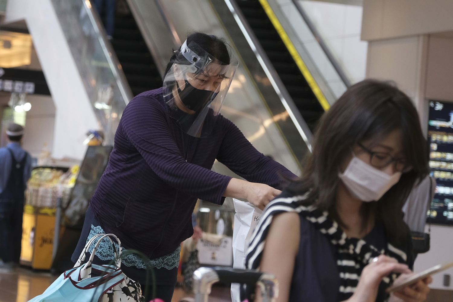 Turisti all'aeroporto di Haneda, Tokyo