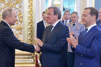 Vladimir Putin con Gerhard Schroeder