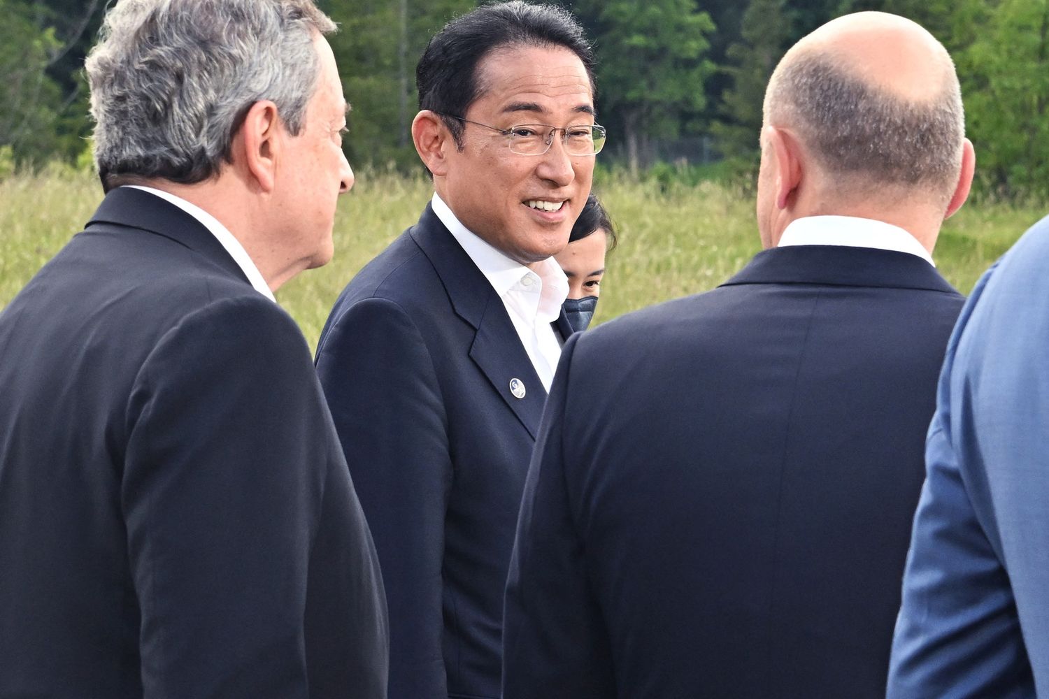 Mario Draghi, Fumio Kishida e Olaf Scholz
