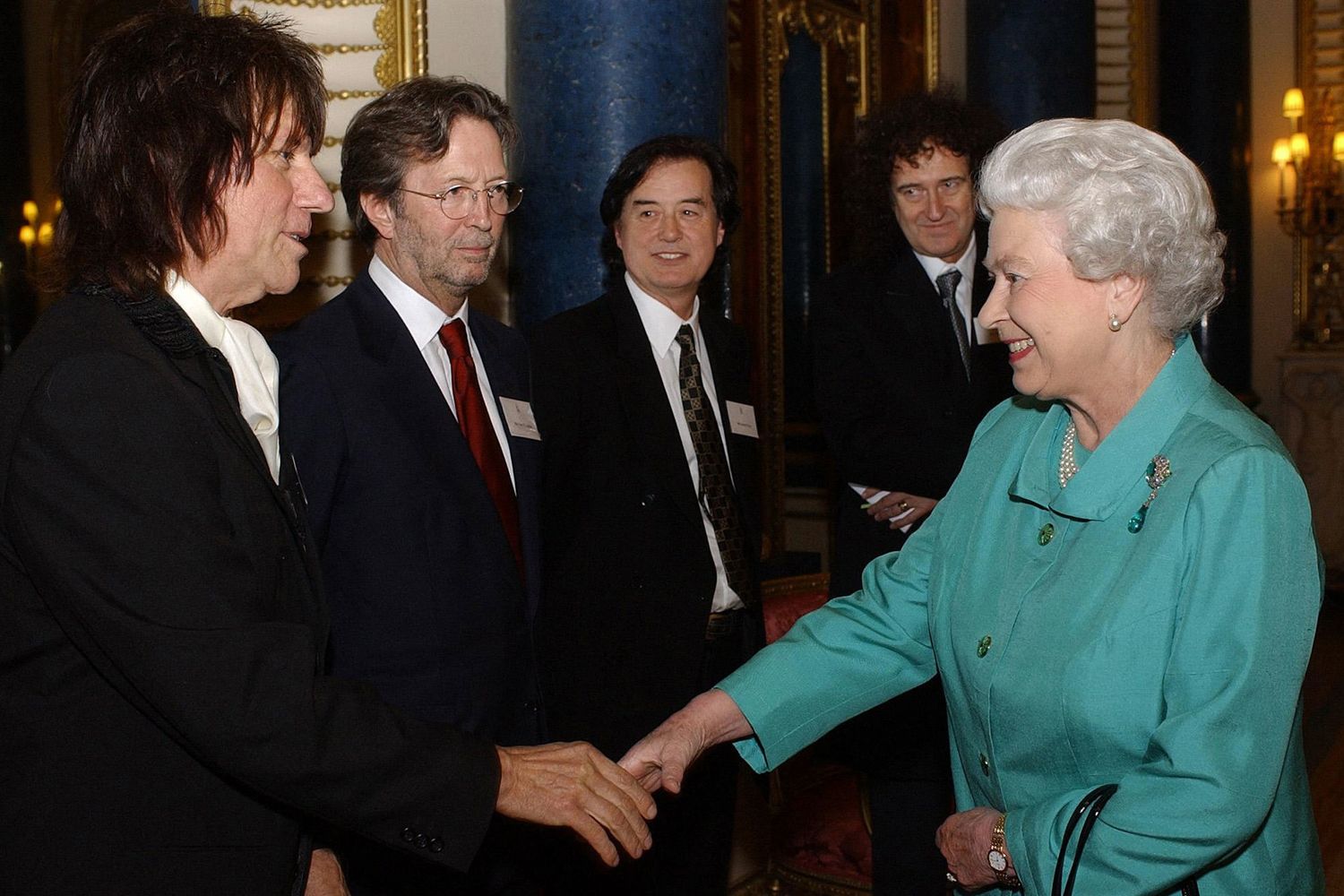 La regina con Brian May, Eric Clapton e Jimmy Page