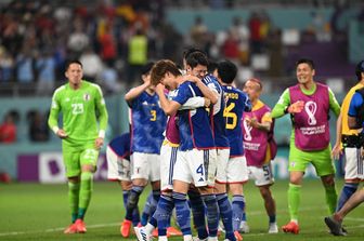 Il Giappone festeggia dopo la vittoria con la Spagna