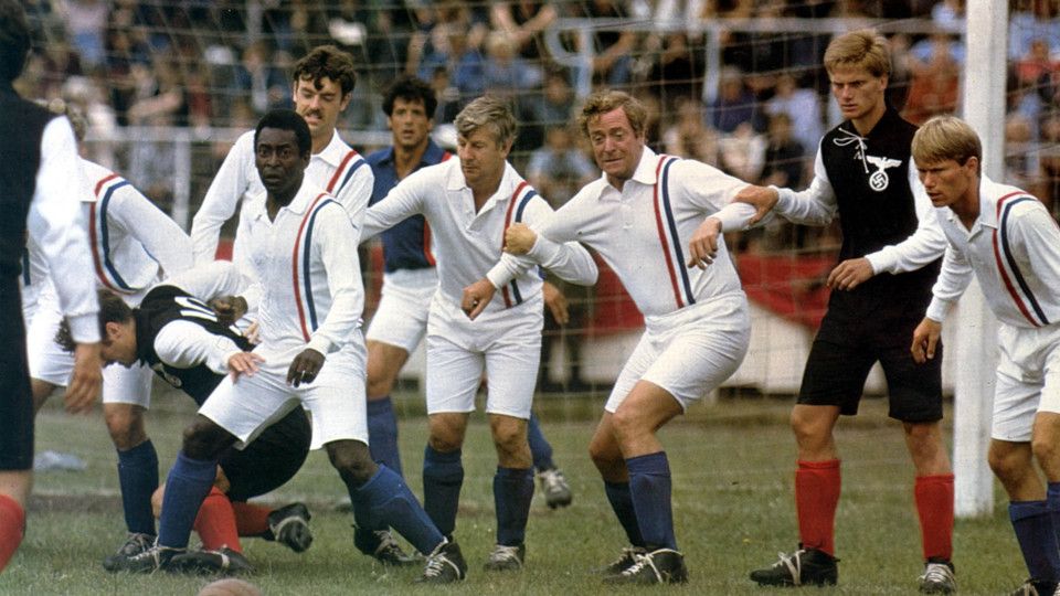 Pel&eacute; attore in Fuga per la vittoria, con Silvester Stallone, Michael Caine, John Wark