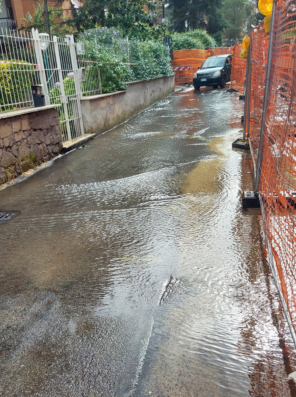Una strada allagata a Roma &nbsp;
