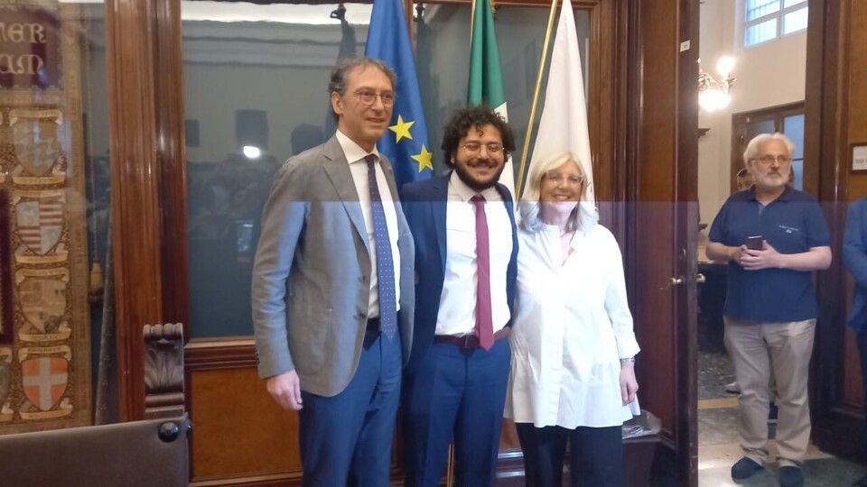 Patrick Zaki con il rettore e la sua professoressa