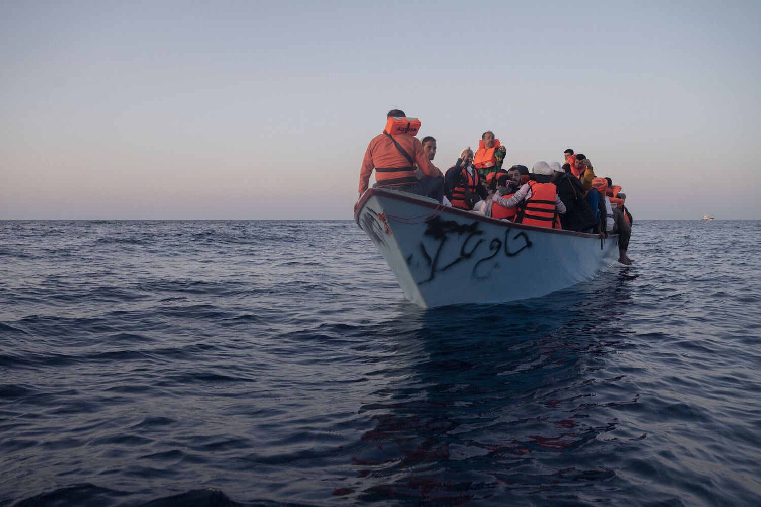 Un barcone di migranti