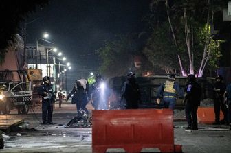 Forze dell'ordine messicane sulla scena di un omicidio