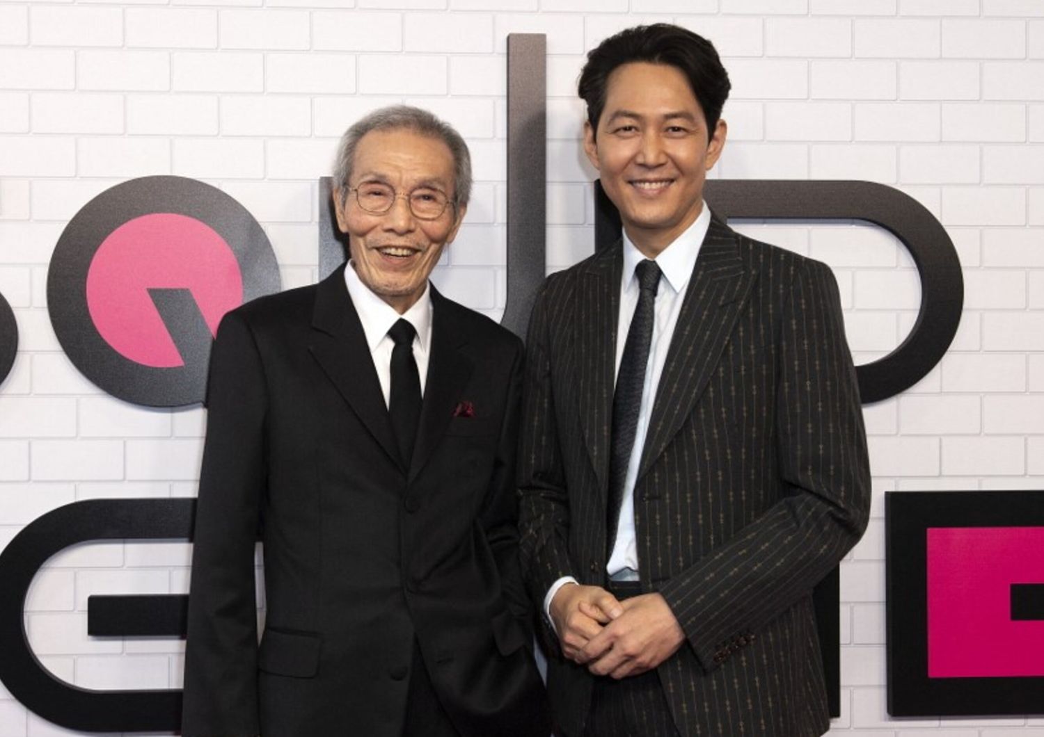 Gli attori Oh Yeong-su (a sinistra) e Lee Jung-jae all'evento "Squid Game" al Netflix FYSEE presso i Raleigh Studios il 12 giugno 2022 a Los Angeles