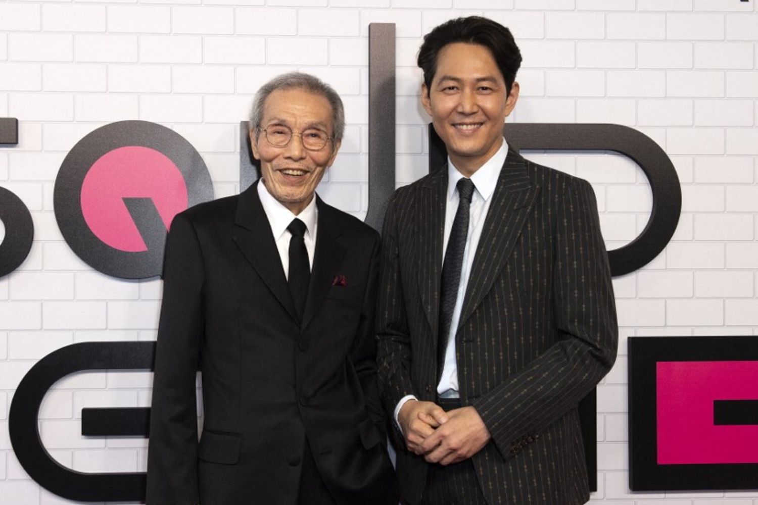 Gli attori Oh Yeong-su (a sinistra) e Lee Jung-jae all'evento "Squid Game" al Netflix FYSEE presso i Raleigh Studios il 12 giugno 2022 a Los Angeles
