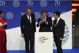 Winners of Spain's 2021 Premio Planeta award Jorge Diaz, Antonio Mercero and Augustin Martinez receive the trophy for their novel "La Bestia", written under the pseudonym Carmen Mola