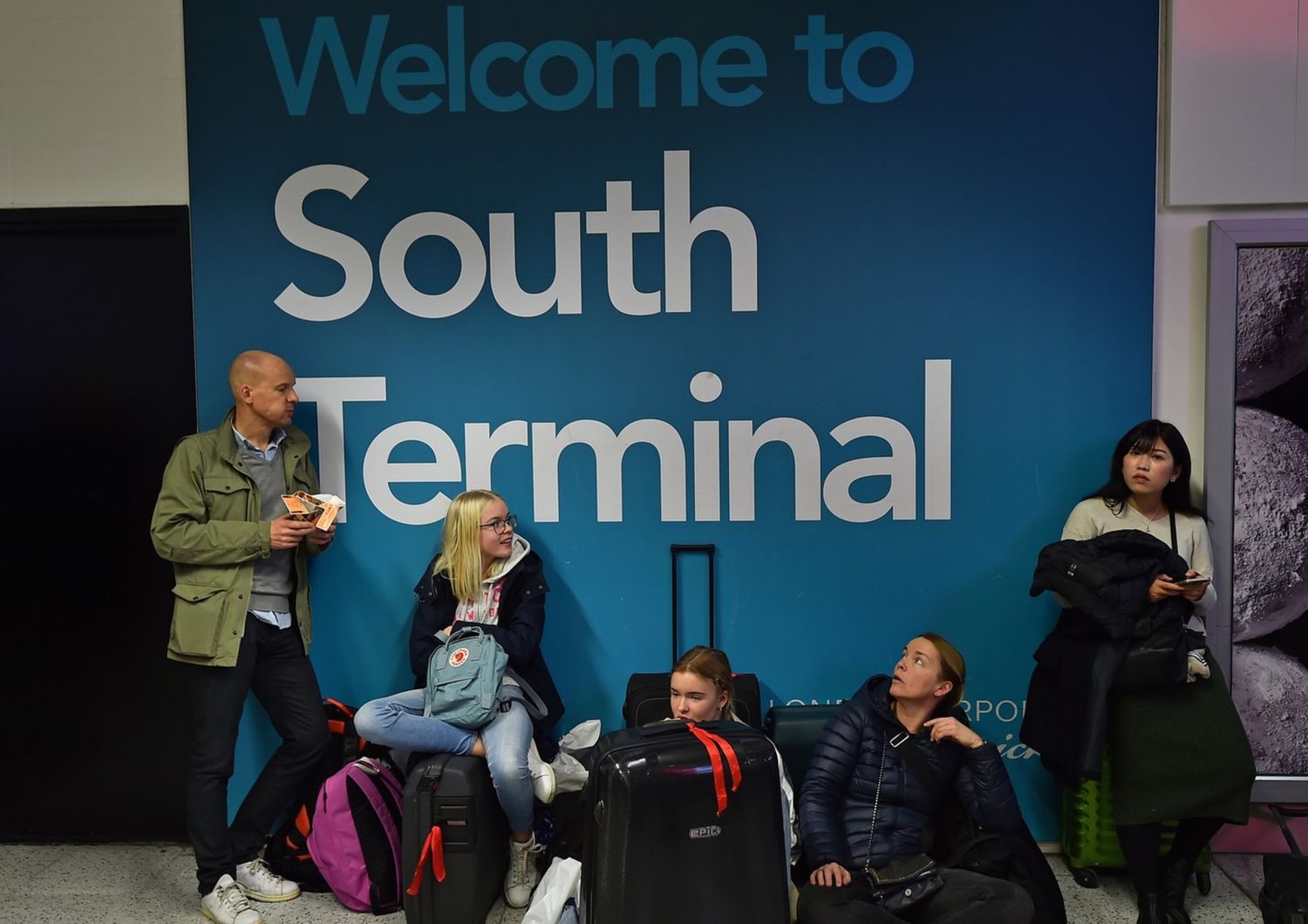 &nbsp;Passeggeri in attesa nell'aeroporto di Gatwick