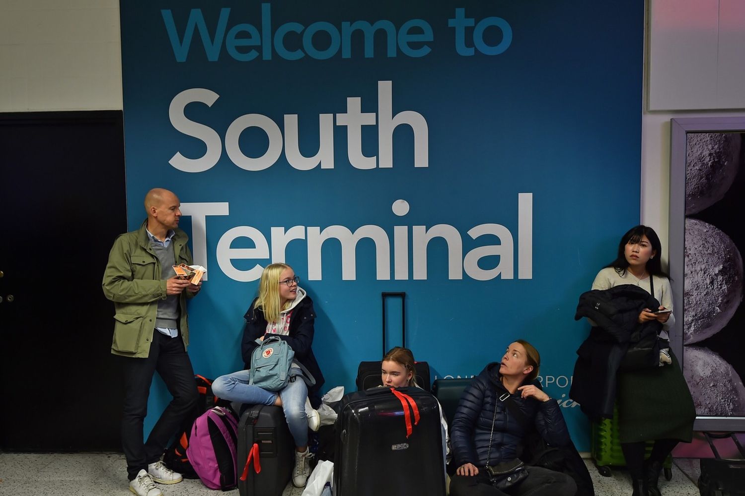 &nbsp;Passeggeri in attesa nell'aeroporto di Gatwick