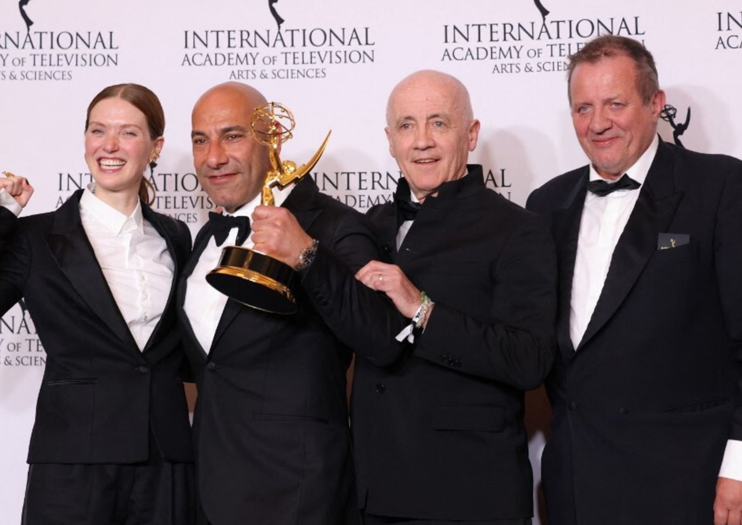 French actress Fleur Geffrier , producer Sam Kozhaya, executive producer Jean Luc Berlot and director Alfred Lot pose with the Drama Series award for "Les Gouttes de Dieu [Drops of God]"