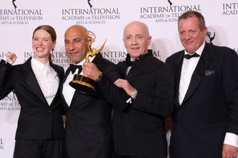 French actress Fleur Geffrier , producer Sam Kozhaya, executive producer Jean Luc Berlot and director Alfred Lot pose with the Drama Series award for "Les Gouttes de Dieu [Drops of God]"