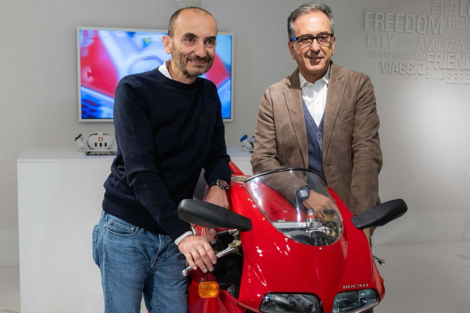 Elio Schiavo (Tim) e Claudio Domenicali (ad Ducati)