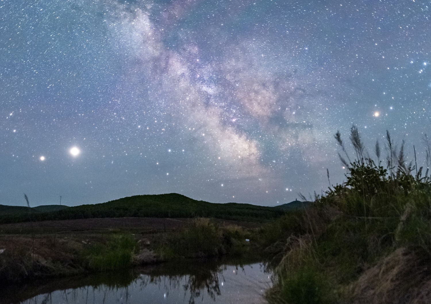La Via Lattea fotograta dal parco naturale dei monti Fengmi, in Cina